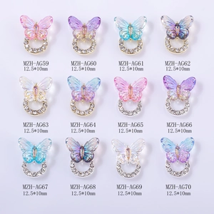 Set of 12 colorful laser butterfly nail charms with rhinestone ring bases for DIY nail art