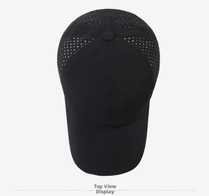 Top view of a black quick-dry baseball cap featuring breathable perforated mesh details