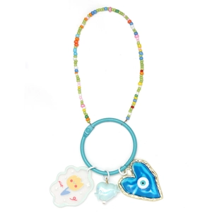 Detailed view of beaded keychain with evil eye, cloud, and heart pendants on white background