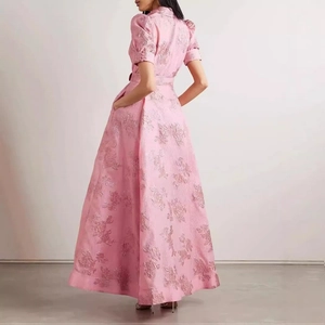 Pink floral jacquard maxi dress with puff sleeves and elegant waist design, side view
