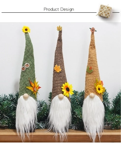Close-up of three autumn gnome wine bottle covers with sunflower and maple leaf details