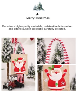 Dettaglio del sacchetto regalo natalizio in iuta con manici a righe e Babbo Natale