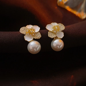 Elegant zircon flower earrings with white pearls and gold accents for women