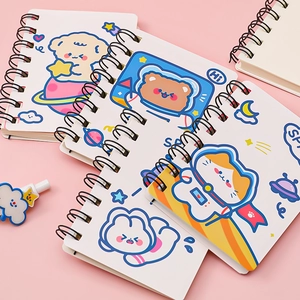 Set of four mini spiral notebooks with cute cartoon astronaut animal space illustrations