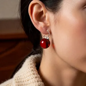Silver needle C-shaped dark red apple pendant earrings with high-end gemstone texture