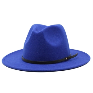 Detail of royal blue fedora hat with a black leather band and golden rivet accent