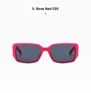 Detail view of rose red rectangular sunglasses frame with dark grey tinted lenses