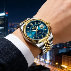 Close-up of luxury men's steel watch with blue dial and date display on a wrist