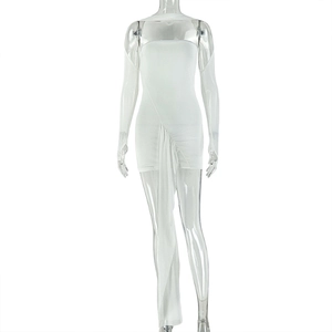Detail of white off-shoulder bodycon mini dress with elegant long side drape detail