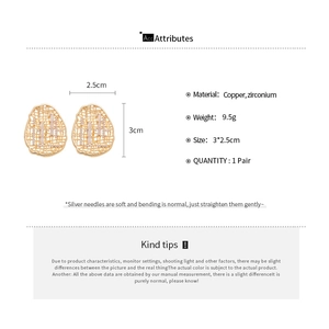 Spécifications de taille et matière pour boucles d'oreilles ovales ajourées