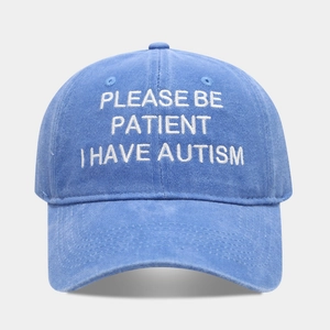 Washed light blue baseball cap with white embroidered letters in retro style