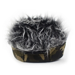 Detail of camouflage wig hat showing messy synthetic hair and adjustable velcro strap
