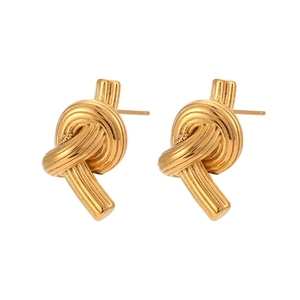 Polished gold knot stud earrings in stainless steel with a minimalist twisted design