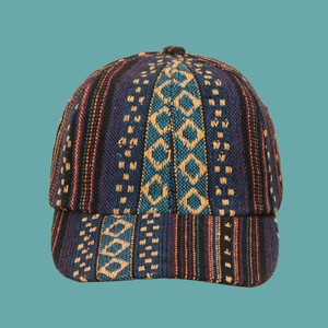 Detailed close-up of Bohemian woven baseball cap with colorful ethnic patterns