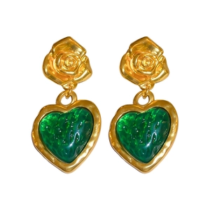 Vintage style gold rose stud earrings with green heart-shaped strawberry texture pendants