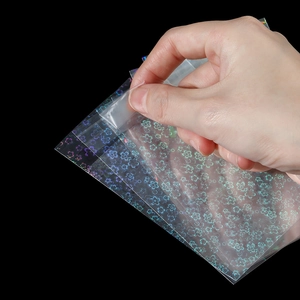 Holographic laser self-sealing pouch with cherry blossom pattern and transparent finish
