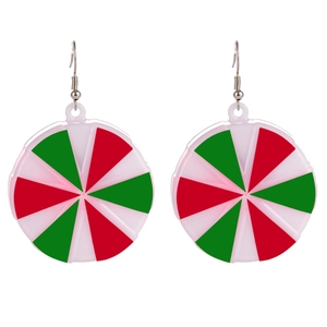 Detailed view of round Christmas earrings featuring festive red, green and white patterns