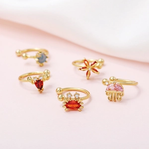 Five-piece gold ear cuff set with ocean motifs and colorful cubic zirconia