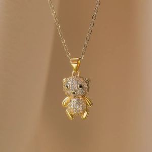 Gold plated bear pendant necklace with sparkling zircons and delicate link chain