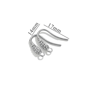 Macro view of 14mm silver stainless steel ear hooks with clear crystals and sizing details