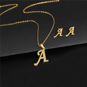 Gold stainless steel necklace and earring set featuring uppercase letter A charm