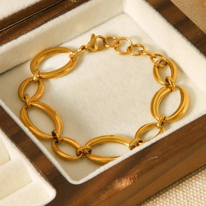 18K gold plated stainless steel bracelet with large oval links in a luxury jewelry box