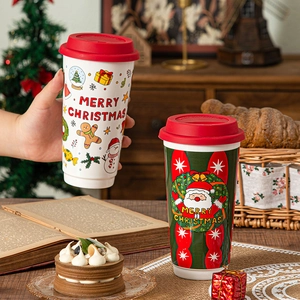 Festive Christmas coffee mugs with red silicone lids featuring Santa and snowman patterns