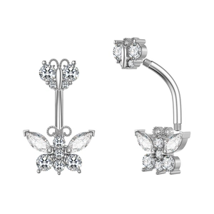 Macro detail of silver butterfly belly ring featuring sparkling clear zircon stones