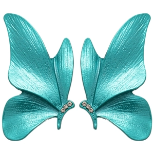 Teal butterfly earrings with silver needles and sparkling crystals on white background