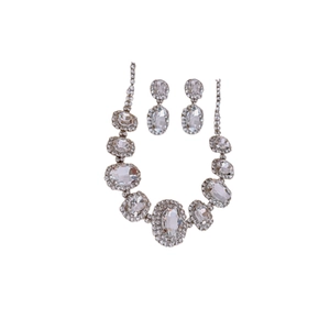 Silver oval rhinestone necklace and earring set with elegant sparkling crystals