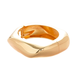 Bracciale rigido dorato geometrico largo con finitura metallica lucida irregolare