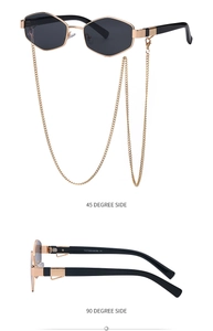 Macro view of gold metal hinges and chain detail on hexagonal dark lens sunglasses