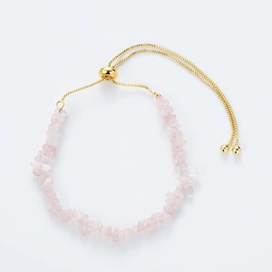 Adjustable gold chain bracelet with natural pink crystal stones in bohemian style