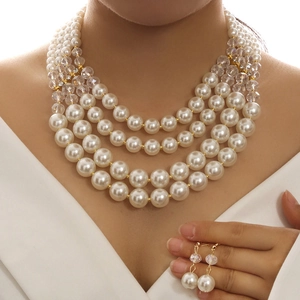 Elegant four-layer pearl and crystal necklace set with matching drop earrings for women