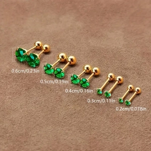 Set of 5 green zircon earrings with screw-back in sizes 2mm to 6mm on brown velvet