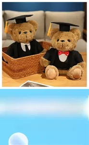 Close-up of plush graduation teddy bears in black caps and gowns as a souvenir gift