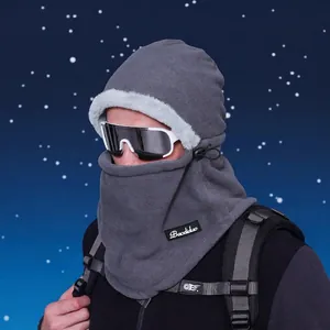 Winter thermal balaclava in grey fleece with faux fur trim and white sports goggles