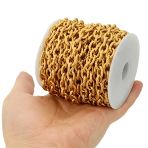 8mm gold stainless steel twist rope chain spool held for size comparison in hand