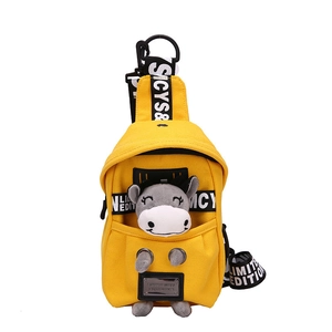 Cute yellow canvas crossbody chest bag for girls featuring a gray plush doll charm