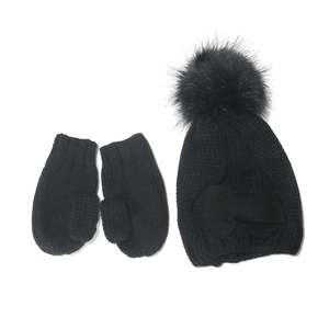 Kids black knit beanie with faux fur pompom and matching warm mittens set for winter