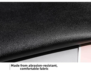 Close-up of durable black lychee grain faux leather showing texture and scratch resistance