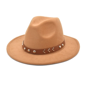 Close-up of camel wool fedora hat featuring a leather band with metal studs and V-shape trim