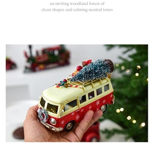 Handheld vintage Christmas bus model with mini trees and gift boxes for festive decor