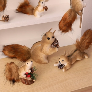 Cute foam squirrels with pine cones for Christmas tree decoration and festive desktop display