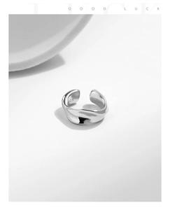 Detail view of S925 sterling silver irregular wavy ring with clear hallmark engraving