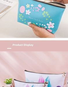 Detail view of printed waterproof PU makeup bags with metal zippers and floral patterns