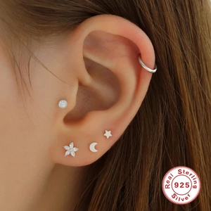 Classic S925 sterling silver cartilage stud earrings featuring round cubic zirconia designs