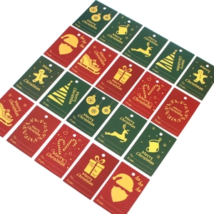 Christmas gift tags with festive patterns and gold foil lettering on red and green paper