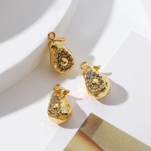 Detailed view of three 18K gold-plated pear pendants with sparkling cubic zirconia inlay
