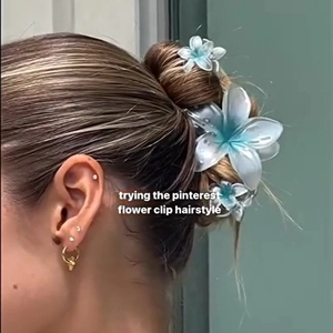 Blue gradient flower claw clip for beach hair styling inspired by Pinterest floral trends